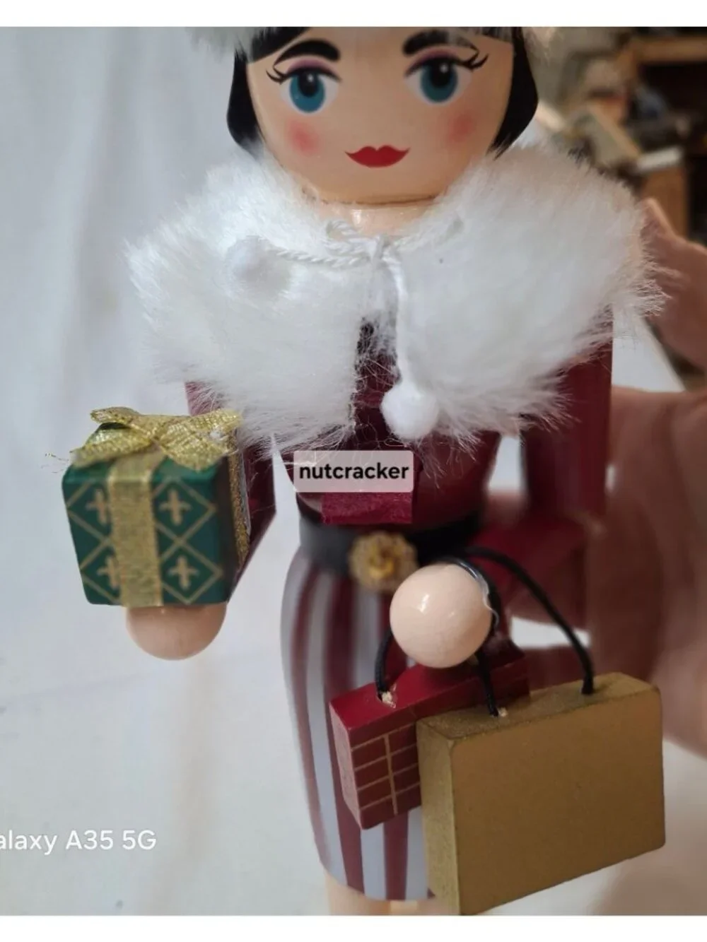 Festive Nutcracker Figurine Woman Holding Gift Bags Fur Accents 12